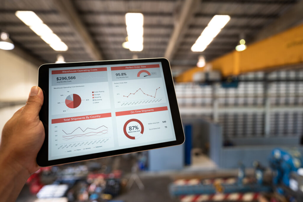 Australian tradesperson reviewing a working capital health check on a mobile device to manage business expenses and cash reserves.