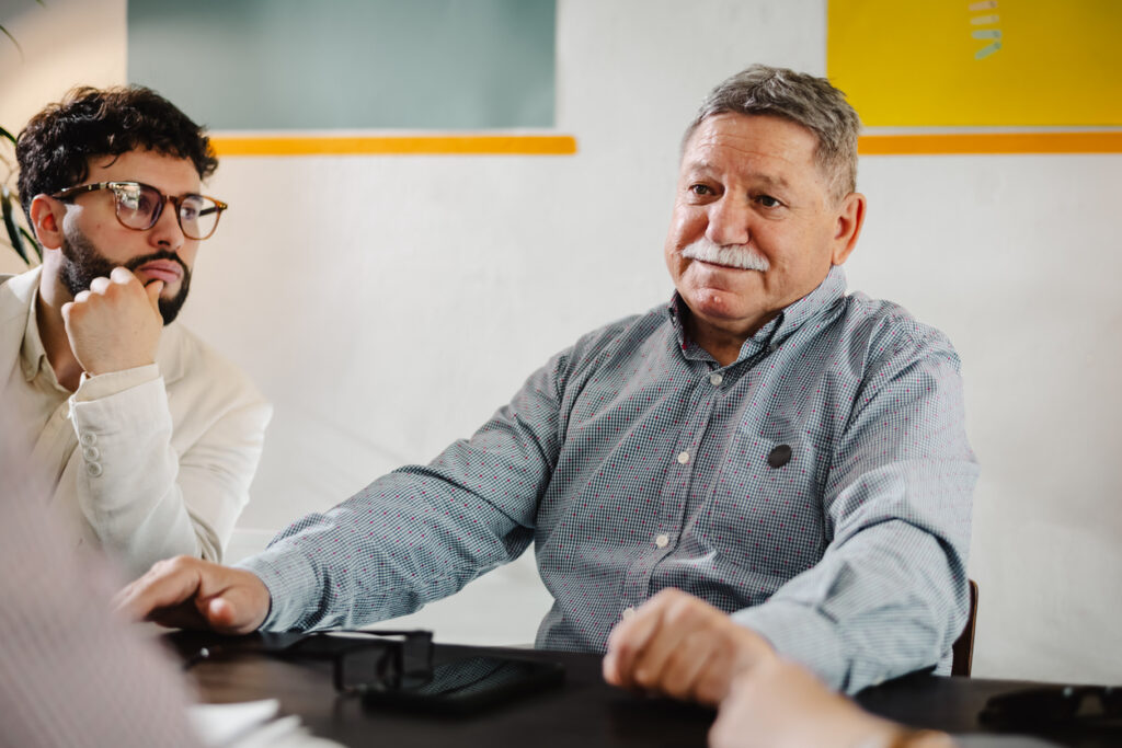 Australian trade business owner consulting with an accountant regarding superannuation strategies and business succession planning.